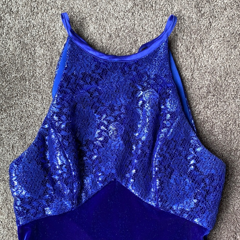 Strapless open back long length gown.